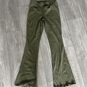 Green flared leggings